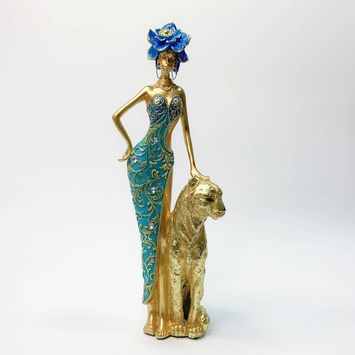 Goldene afrikanerin statue